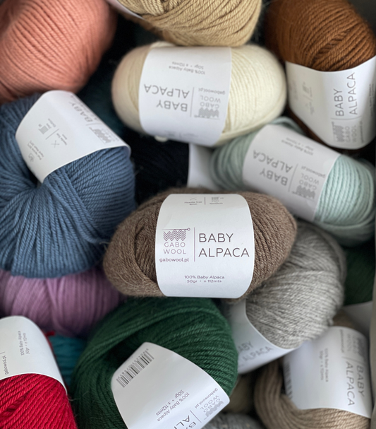 Assorted colors of baby alpaca yarn with labels